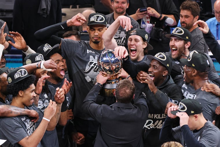 The San Antonio Spurs celebrate after defeating the Oklahoma City Thunder in the Western Conference finals.