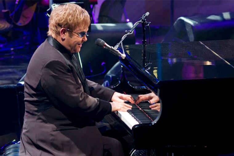 Elton John in a 2010 concert. His set at the Wells Fargo Center Wednesday ranged over classic hits ("Philadelphia Freedom") and new songs ("Home Again," "Oceans Away").