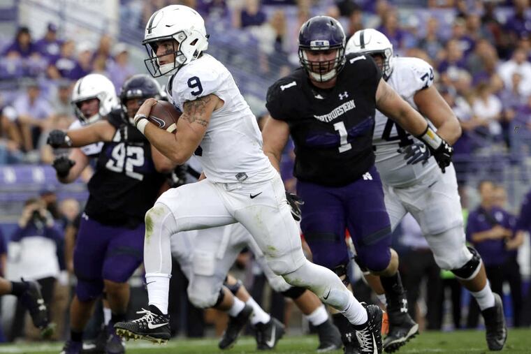 Penn State’s Trace McSorley scores on a 5-yard run at Northwestern.