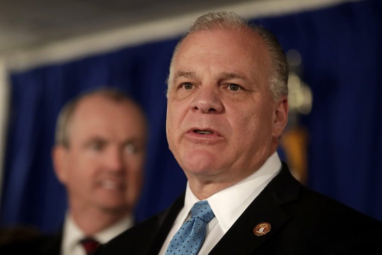 New Jersey Sen. Stephen Sweeney (D., Gloucester) speaks during a news conference before Gov. Phil Murphy, who is standing in the background, signed the first executive order of his administration in Trenton last week.