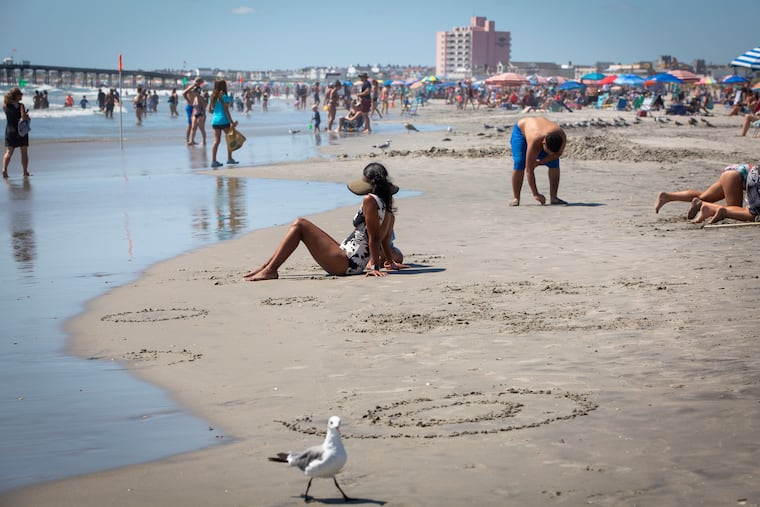 People gather at the beach in Ocean City, N.J., on Labor Day 2020.