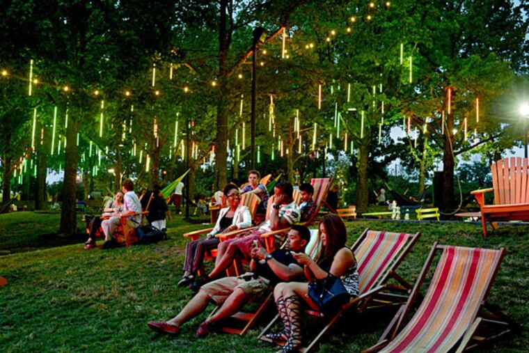 Spruce Street Harbor Park, a visually stunning riverfront pop-up, with lounge seating, floating gardens and all the food you can eat. (TOM GRALISH/Staff Photographer)