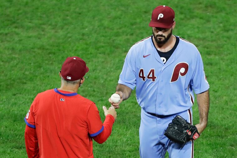 Phillies relief pitcher Brandon Workman gets replaced by manager Joe Girardi after giving up a ninth-inning RBI triple to the Mets Dominic Smith on Thursday.