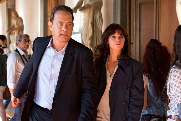 Tom Hanks as Robert Langdon and Felicity Jones as Sienna Brooks move through the Uffizi Gallery art museum in Venice, Italy, in "Inferno."