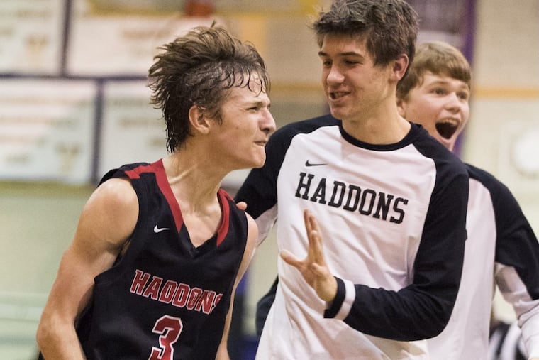 Mike Depersia (left) of Haddonfield celebrates after making a shot three-quarters length of the court at the end of the 3rd quarter in the South Jersey Group 2 Final in boys' basketball on March 7, 2017. CHARLES FOX / Staff Photographer