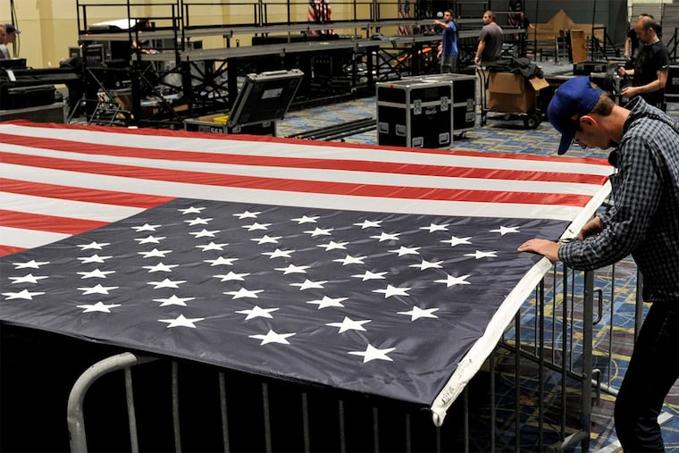 Convention Center workers dismantling the stage for Hillary Clinton's victory party.