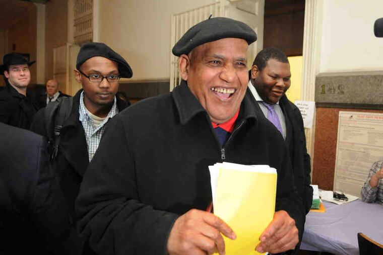 Milton Street, brother of former Mayor John Street, leaves board of elections office yesterday after filing campaign paperwork.