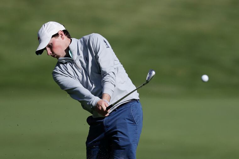 Jeremy Wall hits his second shot on the par-4 sixth hole.