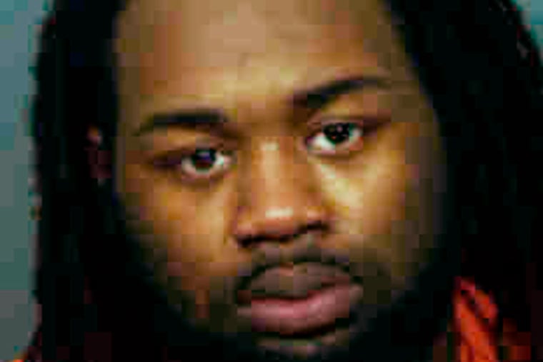 FILE - This undated file photo provided by the state's attorney's office in Prince George's County, Md., shows Malik Ford. His brother, Michael Ford, is charged with attacking a Maryland police station while his two brothers videotaped the shootout, which led to an officer mistakenly killing an undercover detective. Michael Ford faces a prison sentence for his conviction on a murder charge in the friendly-fire killing. He is scheduled to be sentenced by a Prince George’s County judge on Thursday, Jan. 10, 2019. (Prince George's County State's Attorney's Office via AP)