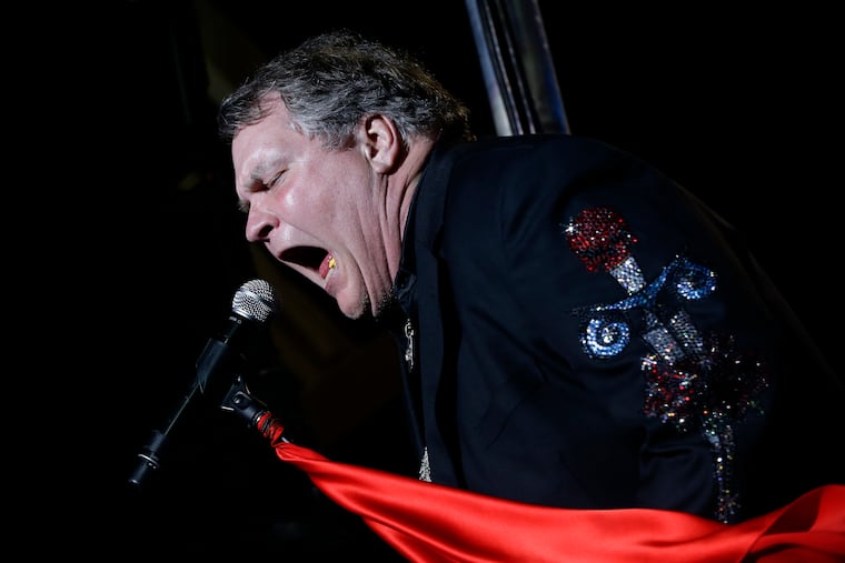 Singer Meat Loaf performs in support of Republican presidential candidate and former Massachusetts Gov. Mitt Romney at the football stadium at Defiance High School in Defiance, Ohio, Thursday, Oct. 25, 2012. Meat Loaf, whose "Bat Out Of Hell" album is one of the all time bestsellers, has died, family said on Facebook, Friday, Jan. 21, 2022.