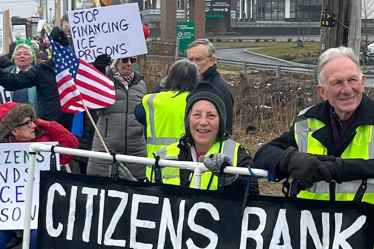 Protesters at the Citizens Bank branch on Kirkwood Highway near Wilmington on March 7.