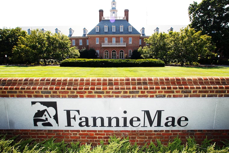 Both Fannie Mae and Freddie Mac, government-sponsored mortgage financiers, plan to charge a 0.5% fee on refinanced mortgages starting Sept. 1. This file photo shows the Fannie Mae headquarters in Washington.