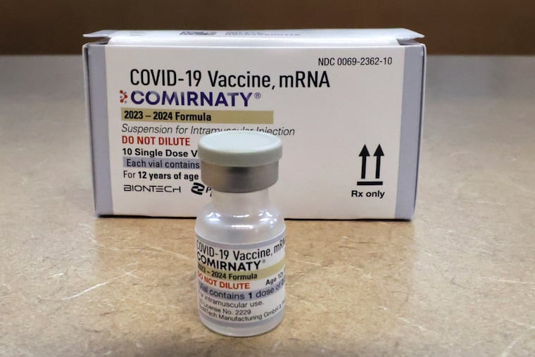 Comirnaty, a new Pfizer/BioNTech vaccination booster for COVID-19, is displayed at a pharmacy in Orlando, Fla., on Friday, Sept. 15, 2023. The CDC is reducing its recommended isolation period for COVID patients, saying that most Americans have some immunity to the virus either through the vaccine or prior infection. Still, they said, uptake rates for the newest COVID vaccines are low and hospitalizations for COVID could be reduced if more people took the vaccine.
