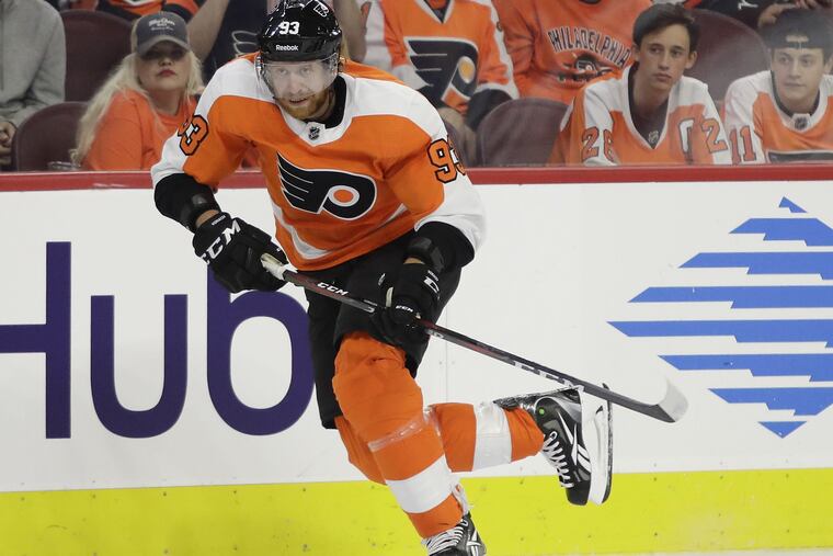 Flyers right winger Jake Voracek skates down the ice in a recent preseason game against the Islanders. Voracek is coming off a season in which he collected a career-high 85 points, including 65 assists.