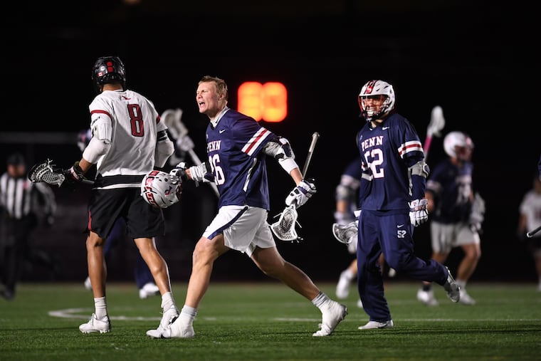 Sam Handley, center, is one of the best midfielders in college lacrosse. His story is a remarkable one considering the sport nearly took his life in 2020.