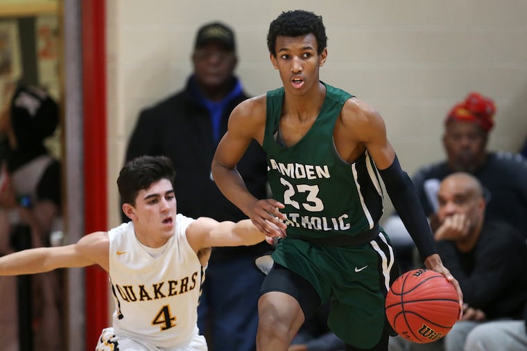 Camden Catholic's Zach Hicks (23), shown here in a game last season vs. Moorestown, has averaged 23.7 points as the Irish have won four in a row to return to the South Jersey Top 10.