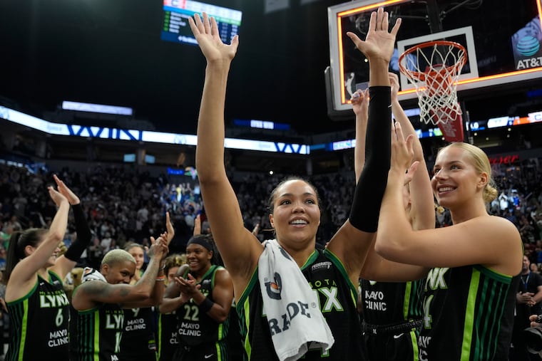 Minnesota Lynx forward Napheesa Collier (center) celebrates with teammates after the 88-77 win against the Connecticut Sun of Game 5. Minnesota will take on the New York Liberty in the WNBA Finals.
