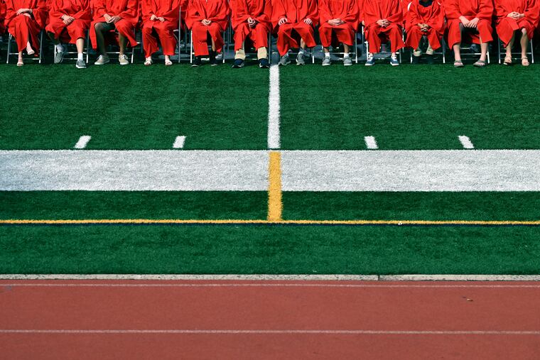 June 23, 2025: Haddonfield eighth graders attend graduation ceremonies on the high school football field.