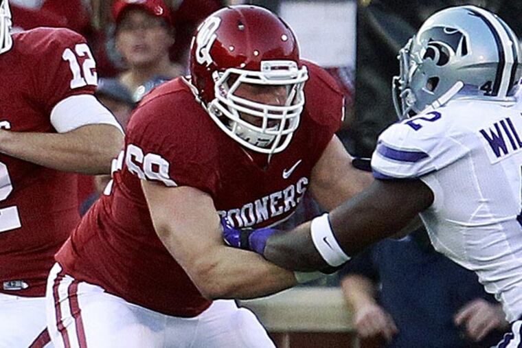 Two independent NFL insiders told the Inquirer that Chip Kelly has zeroed in on Lane Johnson even if top-rated tackles Luke Joeckel or Eric Fisher are on the board. (AP file photo)