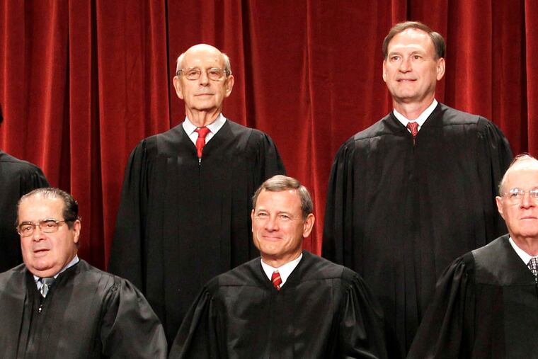 The official U.S. Supreme Court photo in 2010, with Justice Antonin Scalia at left.