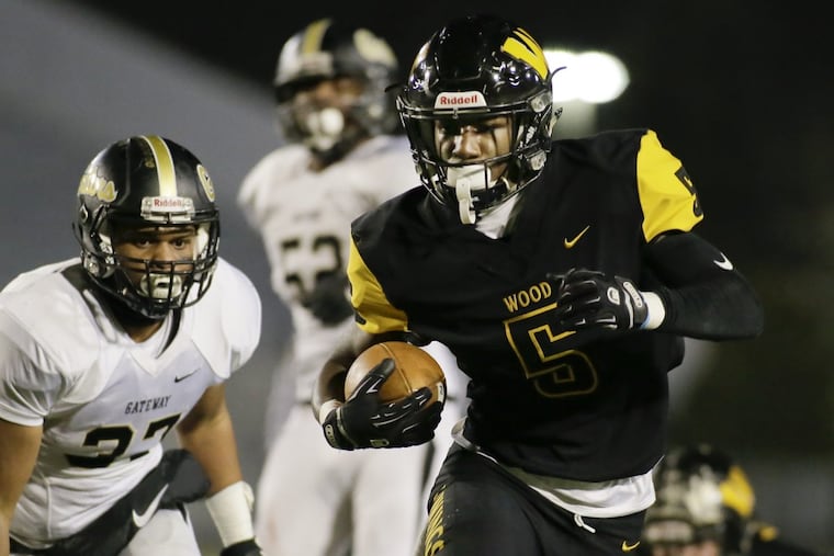 Archbishop Wood's Nasir Peoples, here scoring in the state final, is a member of the Daily News first team.