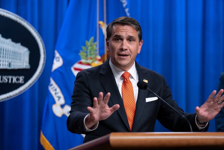 Acting Attorney General Todd Blanche speaks during a news conference regarding developments in the Trump Administration's anti-fraud efforts, at the Justice Department in Washington, Tuesday, April 7, 2026.