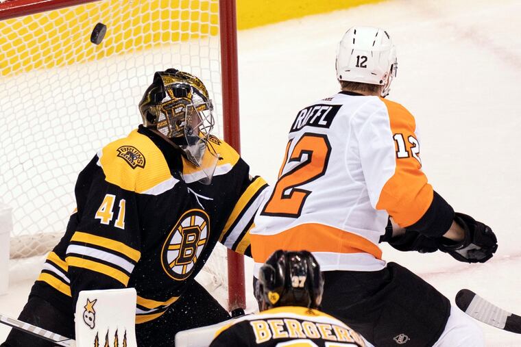Flyers left winger Michael Raffl (12) scores on Boston Bruins goaltender Jaroslav Halak in the Eastern Conference round-robin tournament game last Aug. 2, won by Philly, 4-1. The teams will meet in a regular-season game Thursday in Boston.