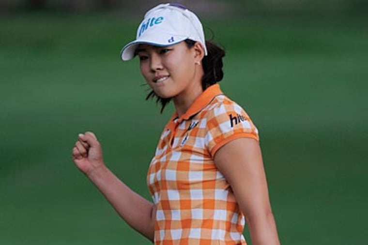 Hee Kyung Seo holds a one stroke lead heading into the conclusion of the final round of the U.S. Women's Open. (Chris Carlson/AP)