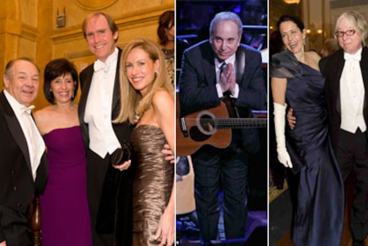 From left: Robert J. Hall, COO of Philadelphia Media Network, his wife, Ronna, Gregory J. Osberg, CEO and publisher, and his wife, Linda; Paul Simon; Joanna McNeil Lewis and Mike Mills, bassist for the band R.E.M