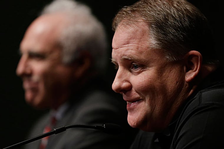 Eagles owner Jeffrey Lurie and head coach Chip Kelly. (Matt Rourke/AP)