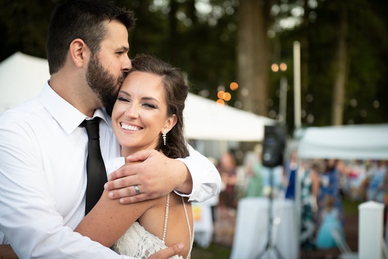 Nicki McCoach and Alex Marlys at their backyard wedding.