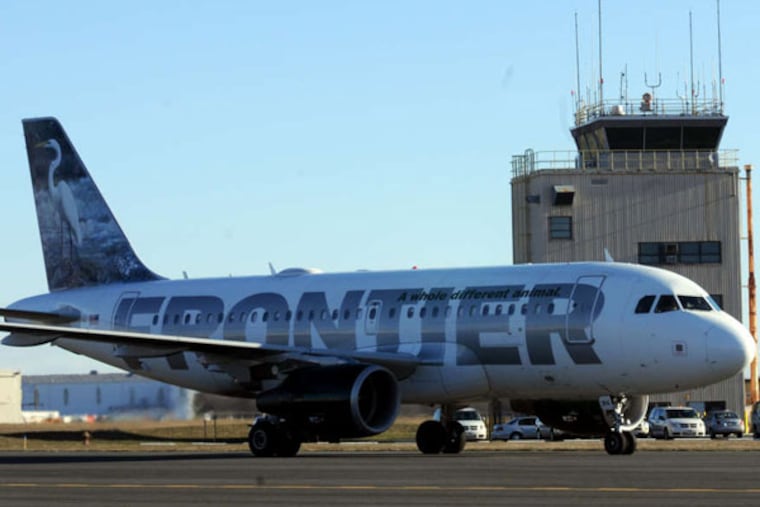 A Frontier Airlines plane at Trenton-Mercer Airport. (April Saul / Staff Photographer)