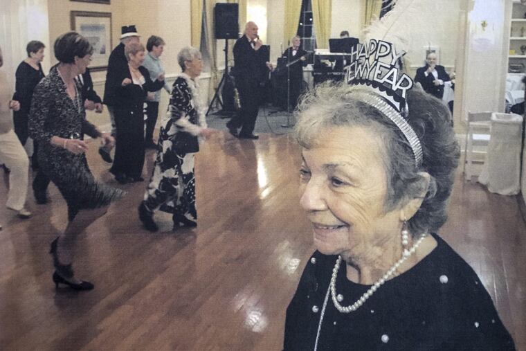 This is a photograph of Ellen Hinds celebrating New Year’s Eve 2016 at Shannondell, about 2 1/2 months before her death.