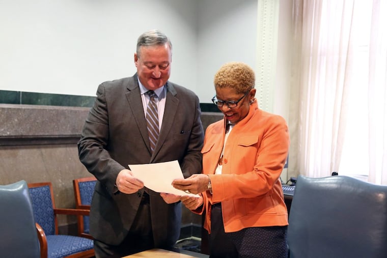 Mayor Kenney and Joyce Wilkerson, current SRC chair, are shown in this file photo. Wilkerson on Monday was named to a list of 27 potential people whom Kenney will consider as members of the new school board.