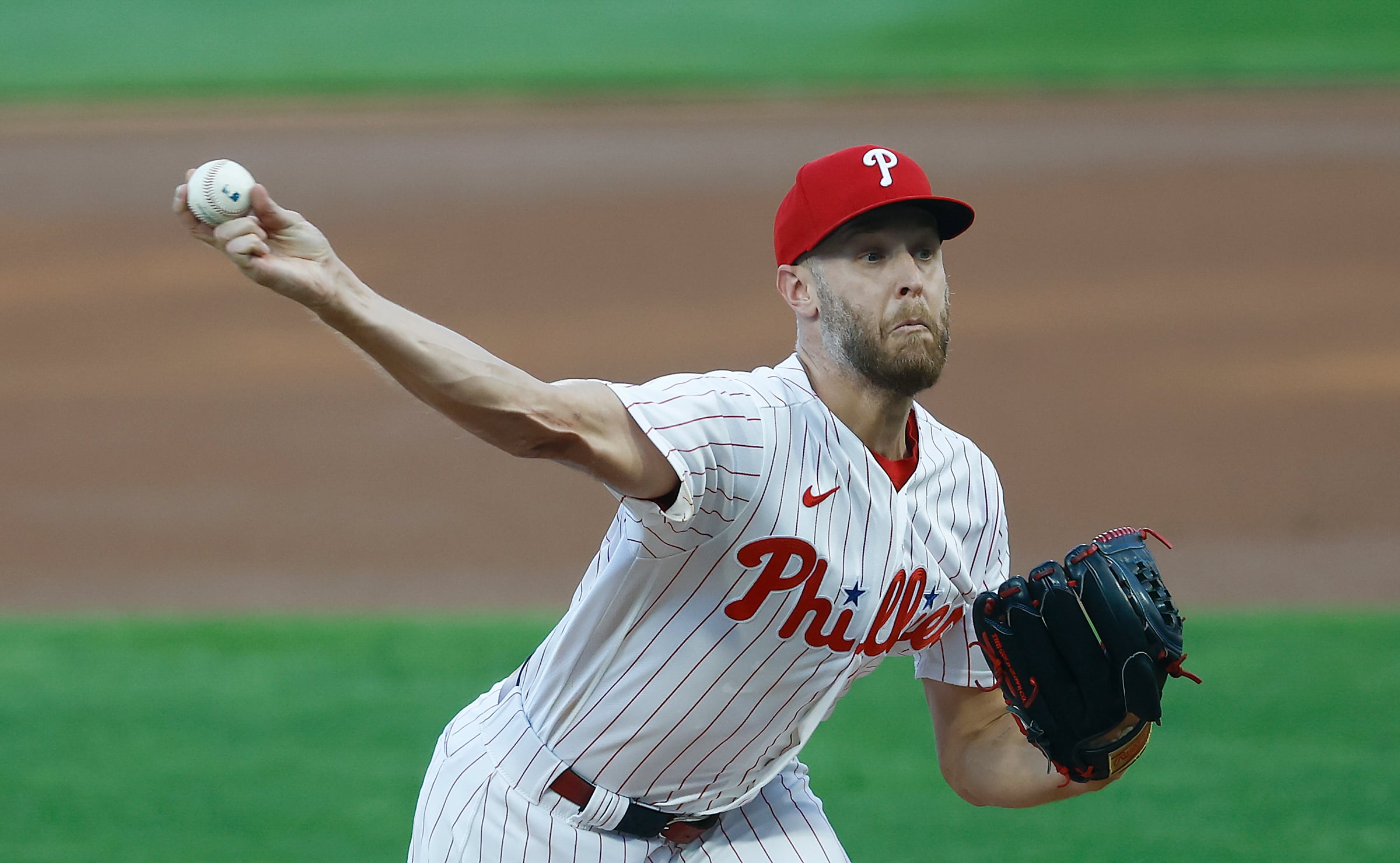 Schwarber's 41st homer cuts Phillies' NL East deficit to four games with win over Braves