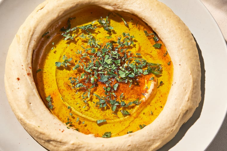 Old City restaurant Zahav will sell signature hummus in select Whole Foods Market locations starting Jan. 16, 2024.