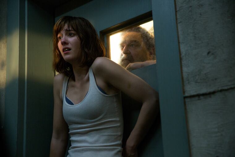 Mary Elizabeth Winstead, left, and John Goodman in a scene from '10 Cloverfield Lane'