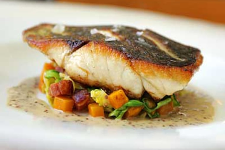 Japanese black bass, served at Little Fish: Sustainable and a new flavor. (DAVID SWANSON / Staff Photographer)