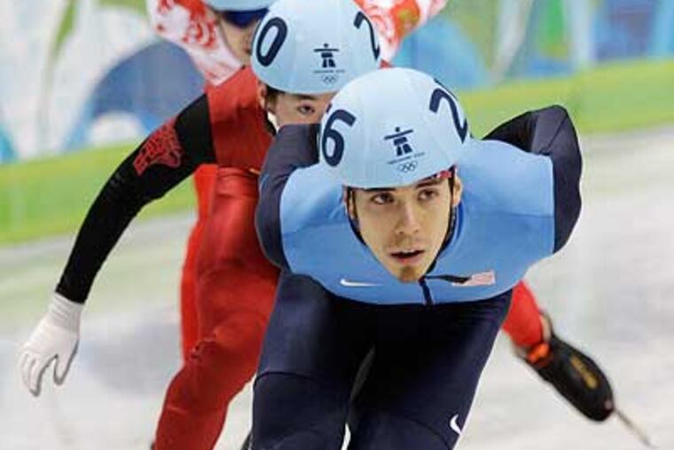 USA's Apolo Anton Ohno leading the pack during a preliminary heat of the 1,000-meter short track competition at the 2010 Vancouver Games. Comcast's NBC Universal won the right to continue broadcasting the Games in the U.S. (Mark Baker / Associated Press)