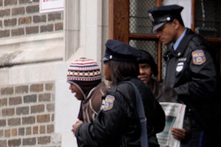 Police take an Alcorn Elementary School student into custody after fumes from pepper spray sickened about 61 people yesterday morning. The student who brought the spray to school was charged with a misdemeanor.