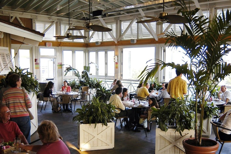 Customers dining on the porch at Bahama Breeze's King of Prussia location in June 2004. The location opened in fall 2003.