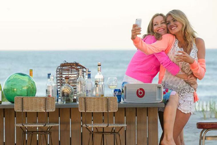 Kate (Leslie Mann, left) and Amber (Kate Upton) frolic near the beach in "The Other Woman" (Barry Wetcher/Twentieth Century Fox)