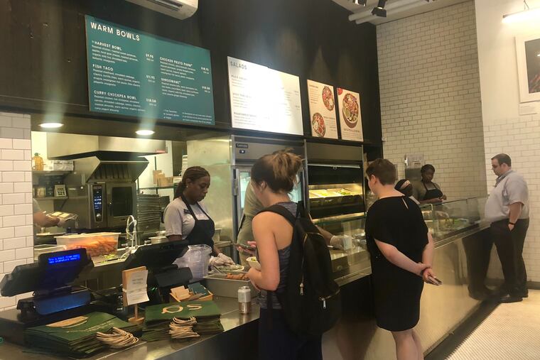 Customers stand in line at Sweetgreen in Center City, Philadelphia on Wednesday, Oct. 2.