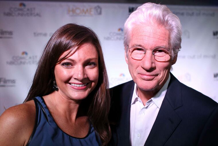 Daily News gossip columnist Jenny DeHuff with actor Richard Gere.