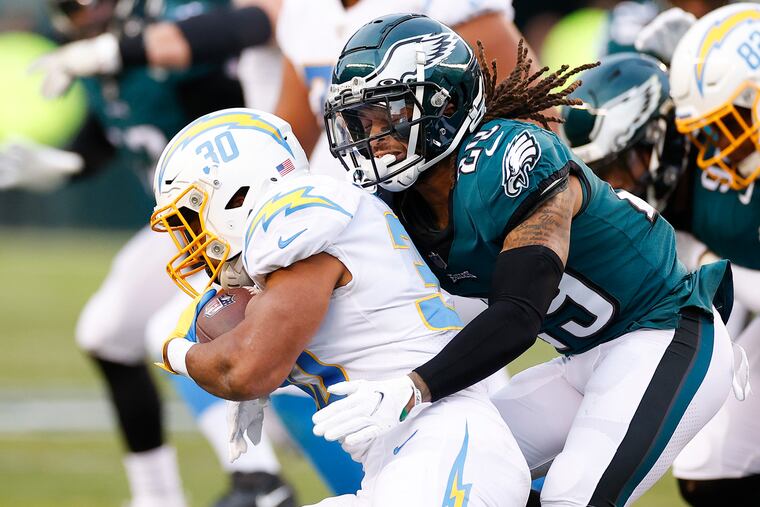 Eagles cornerback Avonte Maddox stops Chargers running back Austin Ekeler on Nov. 21.