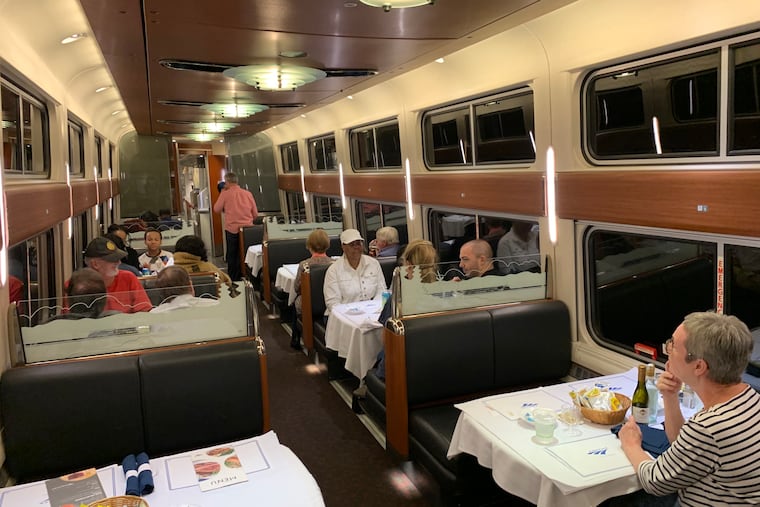 Travelers dine on the Amtrak Crescent as it rolls through Catlett, Va., on Sept. 9.