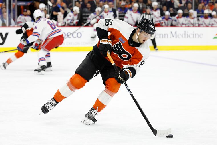 Flyers left wing Joel Farabee skates with the puck against the New York Rangers on Feb. 24.
