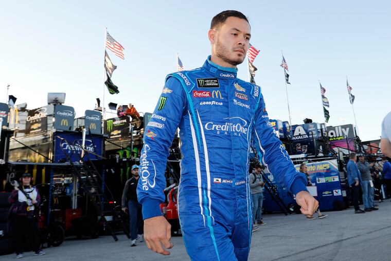 Kyle Larson walking to the garage before the final practice for a NASCAR Cup Series auto race at Kansas Speedway in October in Kansas City, Kan.