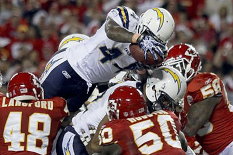 Former West Catholic star Curtis Brinkley scored a late game-tying touchdown on Monday night. (Ed Zurga/AP)