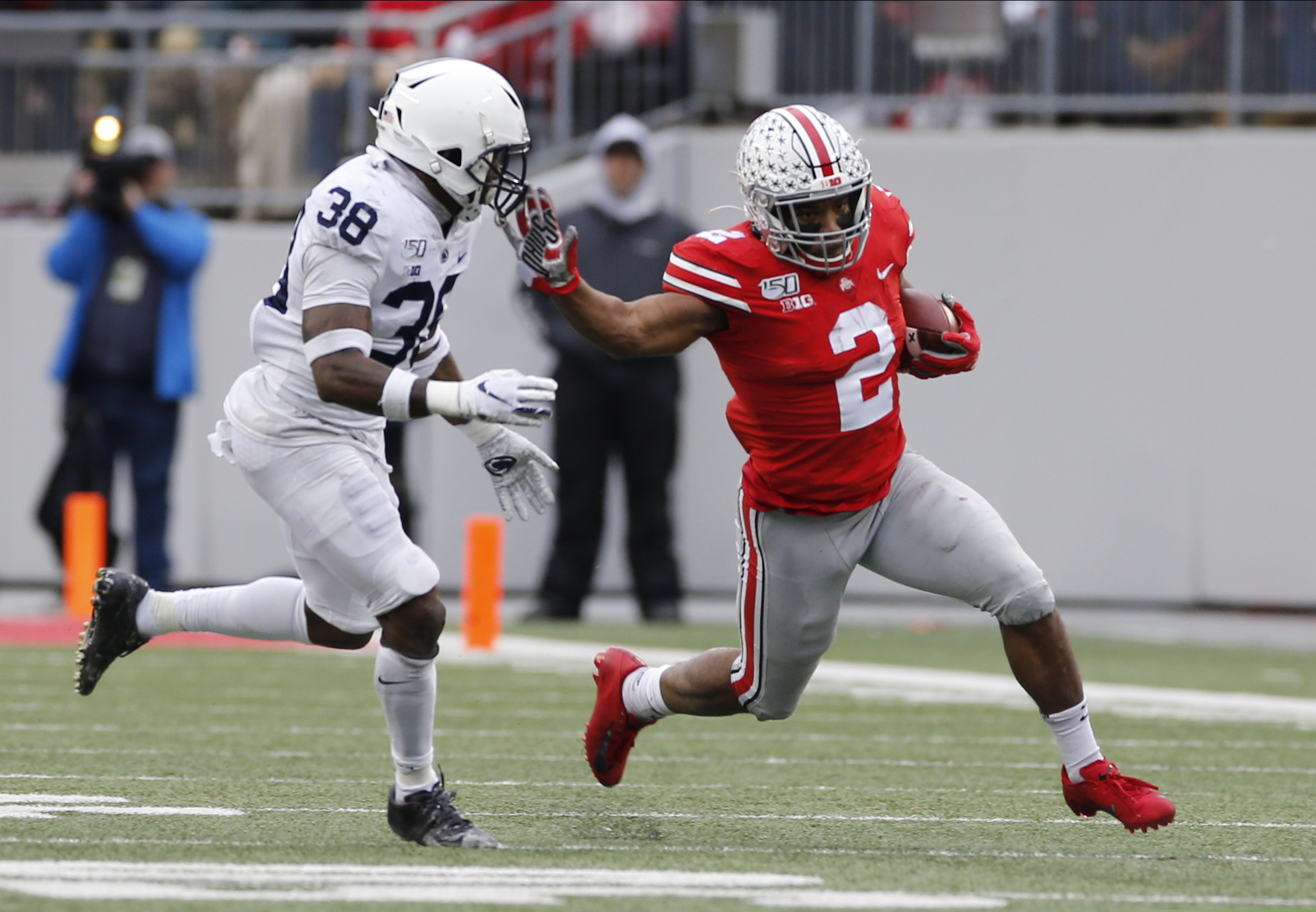 Ohio State running back J.K. Dobbins, right, cut up field against Penn State defensive back Lamont Wade during a game Nov. 23, 2019, in Columbus, Ohio.